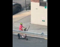 Man ride electric scooter play classical music