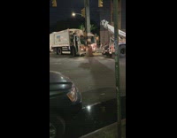 White truck crashes into metal beam pillar on the street, white tow truck takes it away