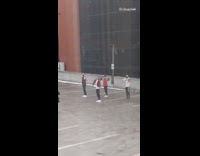 Four men red color outfit dance group parking lot
