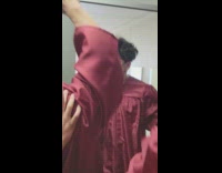 Boys inside bathroom gets hype graduation gown