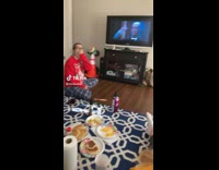 Guy throws brown container at window breaks glass