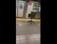 Rolling chair left on subway station platform 