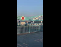 Guy white shirt rap video blue bridge