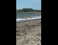 White bikini girl denim shorts friend beach 