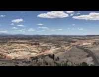 Three people sit in line together 