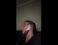 Dog grabbing hoomans face with paw