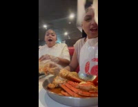 Crab leg slips out hits woman head