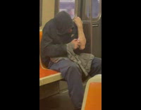 Man lights his arm inside the train at NY 