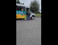 Collab Pets For All - Dogs board on bus for field trip