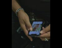 Guy riding subway scrolls through instagram profile