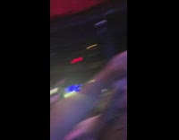 Nav points at his doppelganger while singing on stage at concert