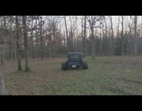 Guy does donuts with vintage black car 
