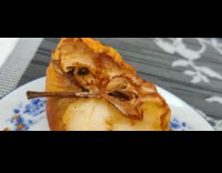 Bug wasp eats brown pear fruit plate 