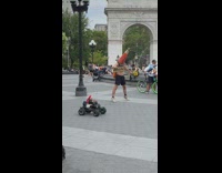 Dolls on cars drive between cone guys legs  
