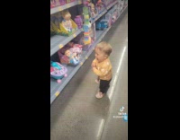 baby in store goes up to stores excited