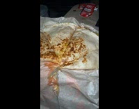 Guy shows off his thick quesadilla from taco bell 