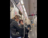 Collab WINY - Two women eat food in subway train