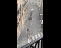 Hail storm pouring on Paris street