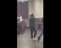 Man wears bloody clown costume inside gym