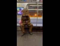 Man puzzle box head inside the train