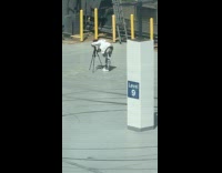 Man with handbag photoshoot rooftop parking lot