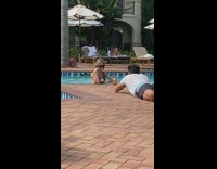 Woman blue bikini drink poolside lay down pictorial Part 1