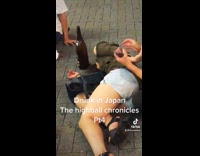 Drunk woman lay on street japan night