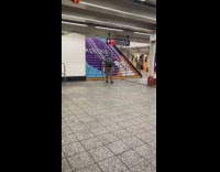 Man cosplay Luigi live stream at subway