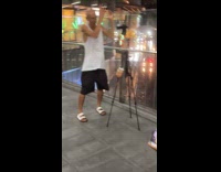 Collab IITW - Skinny bald man live dance outside terminal