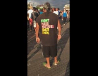 Black shirt guy green fish sandals shoes 