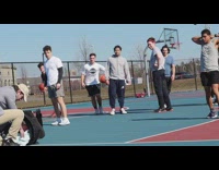 Guy pretends to drop baby from stroller on basketball court 