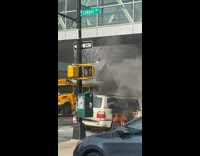 White car caught on fire