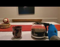 Guy pours coffee with foot