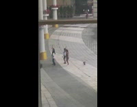 Four women tiktok dance inside the mall