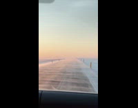 Car drives by snowy road on Iceland