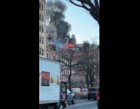 Building roof on fire with black smoke Part 1