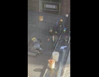 small torch of fire on roof of building