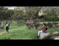 Couple photoshoot garden brown shirt white pants