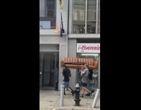 4 skater boys carry couch together 