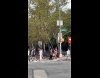 Man fishing/begging for money on street