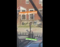 Woman dance aggressively middle of street tiktok