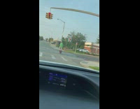 Guy rides bike with low pedal 