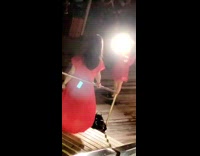 girl red dress stairs bright light