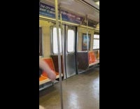 Guy on train makes noises and flails arms 