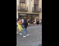 Girls dance on street assistant stumble down