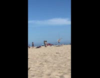 Woman beach pole dance upside down pictorial