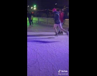 Guy running at fake ice rink 