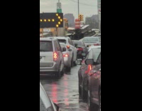 Man Sells Fire Extinguishers in Middle of Traffic