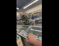 Man tests out knife in the middle of the store