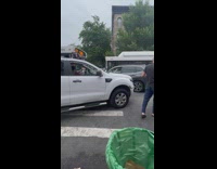 Cars and bus block crosswalk 